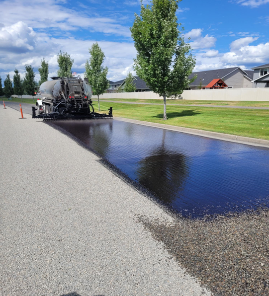 Chip Sealing the street